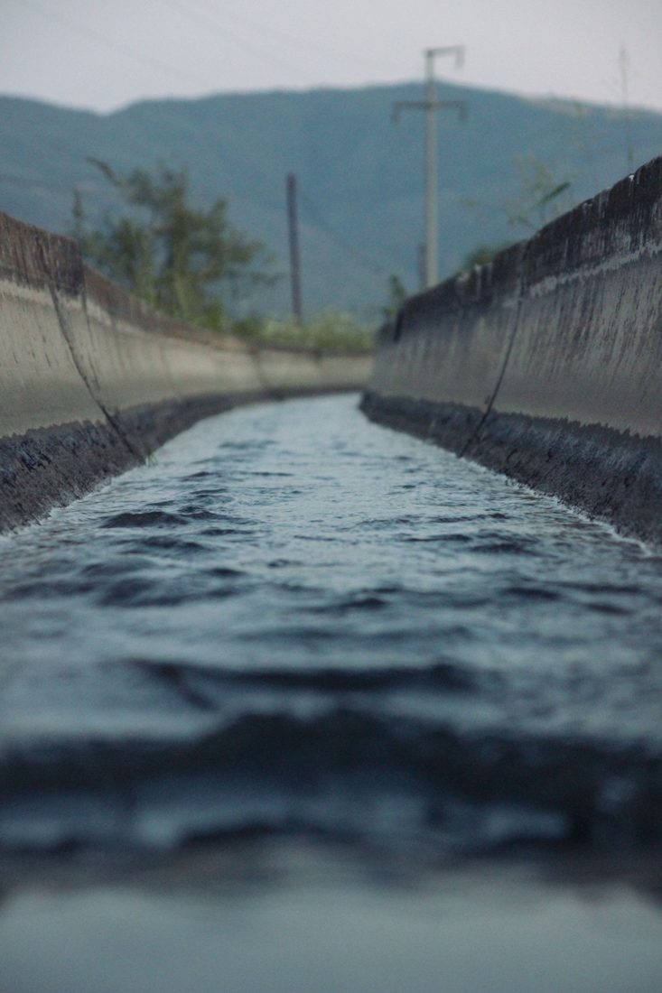 A concrete-lined irrigation canal